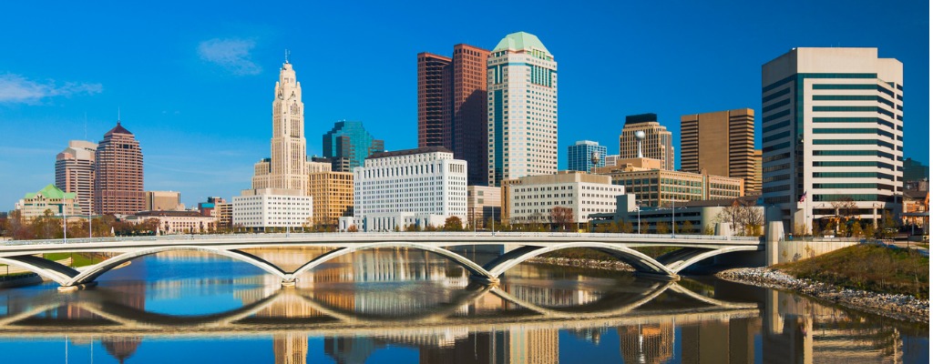 columbus-downtown-skyline-and-bridge-with-mirrorlike-reflection-picture-id474632606