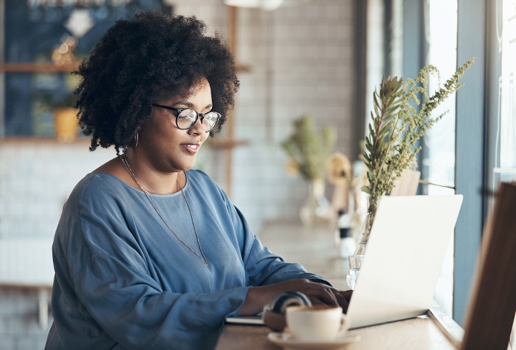 woman looking at computer